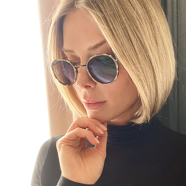 A woman wearing sunglasses